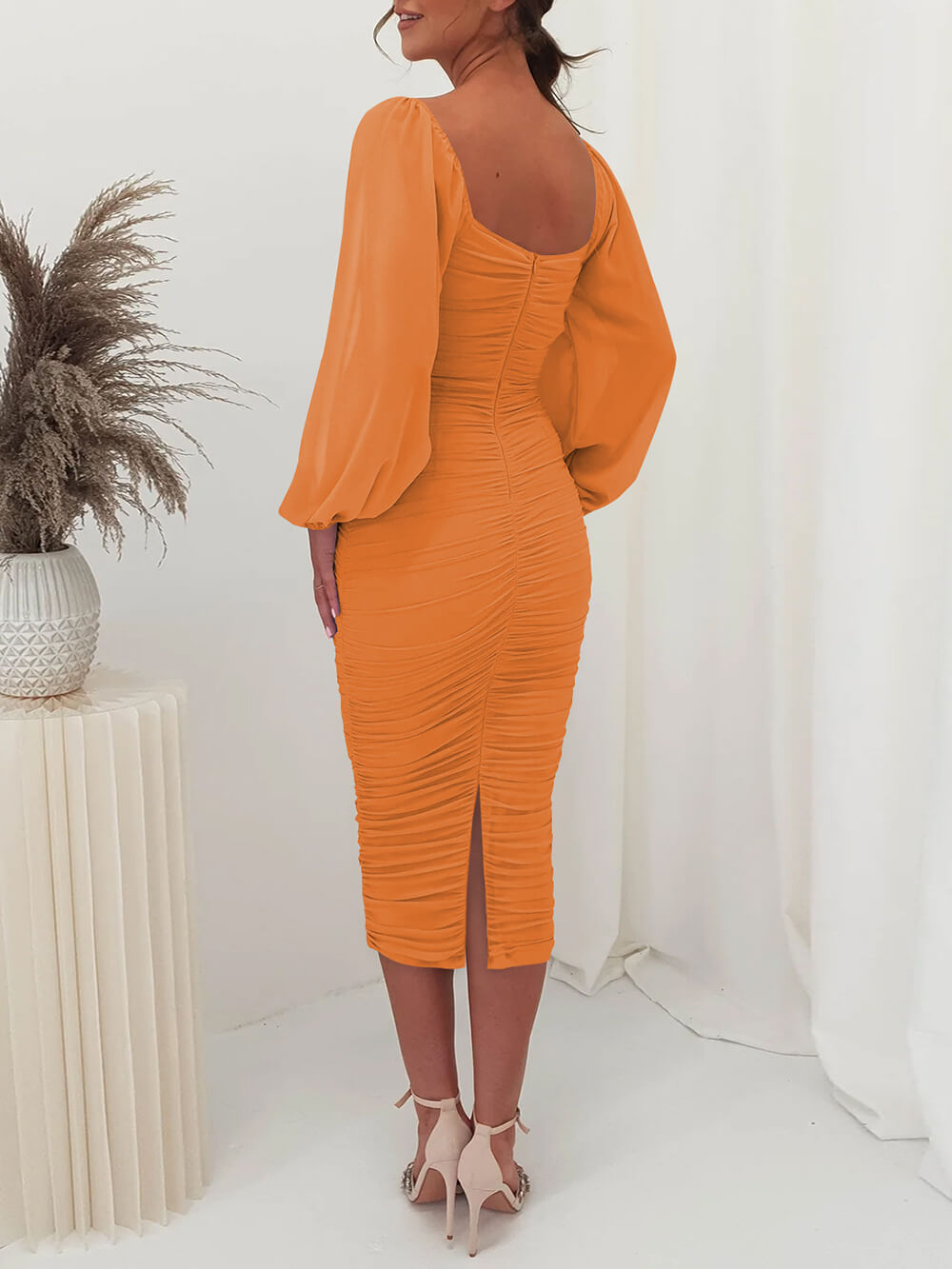 Midi plissé jurk van gebreid materiaal met lange mouwen