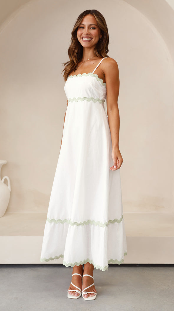 CLARA | LANGE JURK DIE DE ZOMERLIJKE VROUWELIJKHEID BENADRUKT