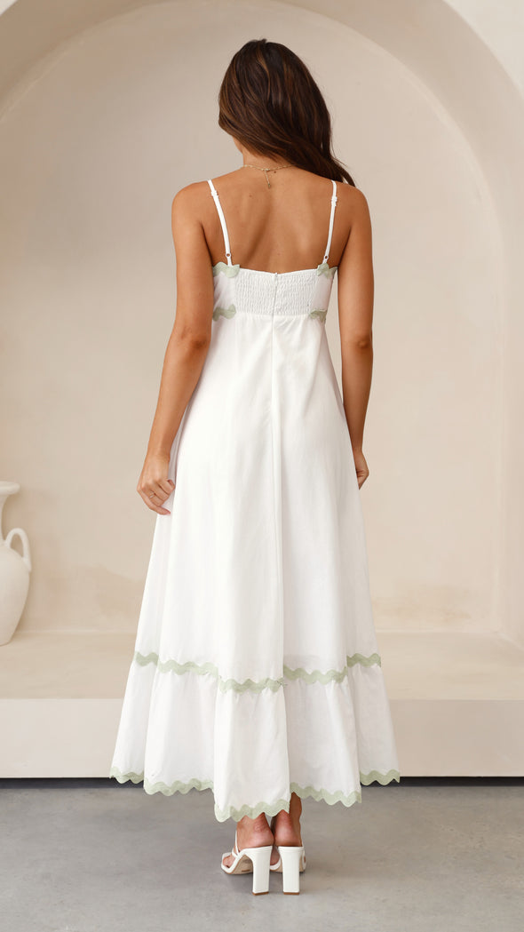 CLARA | LANGE JURK DIE DE ZOMERLIJKE VROUWELIJKHEID BENADRUKT